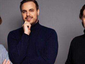 New York Stock Exchange with banner flagging ProShares Bitcoin Strategy ETF on the day it started trading.