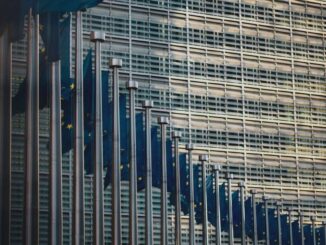 New York Stock Exchange with banner flagging ProShares Bitcoin Strategy ETF on the day it started trading.