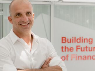 New York Stock Exchange with banner flagging ProShares Bitcoin Strategy ETF on the day it started trading.