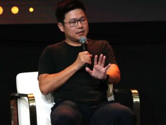 New York Stock Exchange with banner flagging ProShares Bitcoin Strategy ETF on the day it started trading.