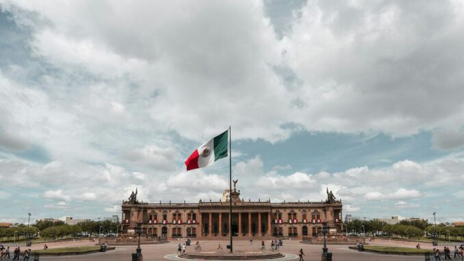 New York Stock Exchange with banner flagging ProShares Bitcoin Strategy ETF on the day it started trading.