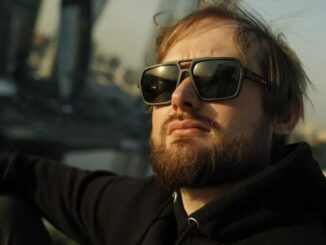 New York Stock Exchange with banner flagging ProShares Bitcoin Strategy ETF on the day it started trading.