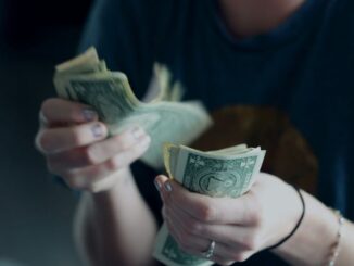 New York Stock Exchange with banner flagging ProShares Bitcoin Strategy ETF on the day it started trading.