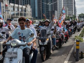 Elvis impersonators (Perry Knotts/Getty Images)