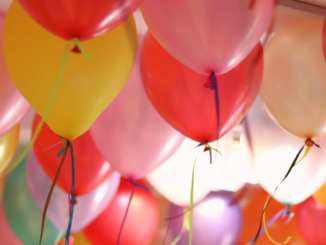 New York Stock Exchange with banner flagging ProShares Bitcoin Strategy ETF on the day it started trading.